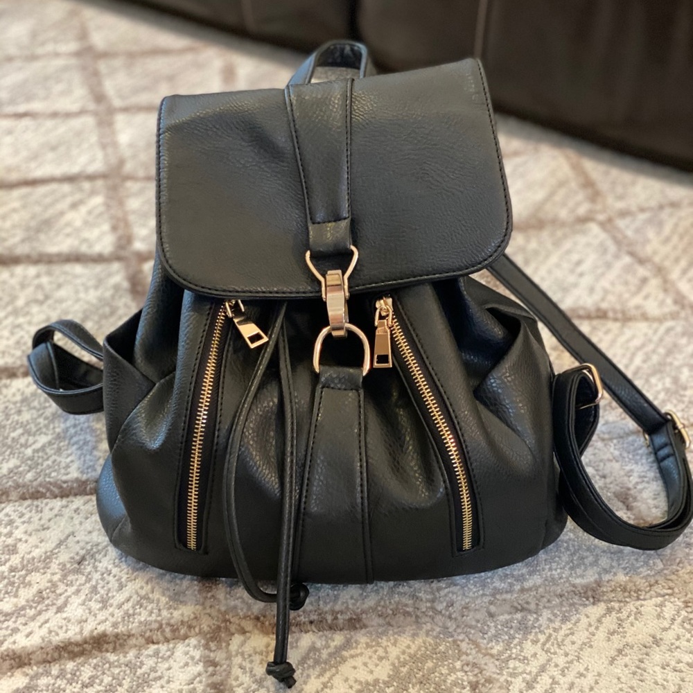 Black faux leather back pack